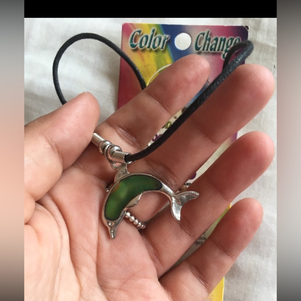 90”S Mood dolphin charm necklace.